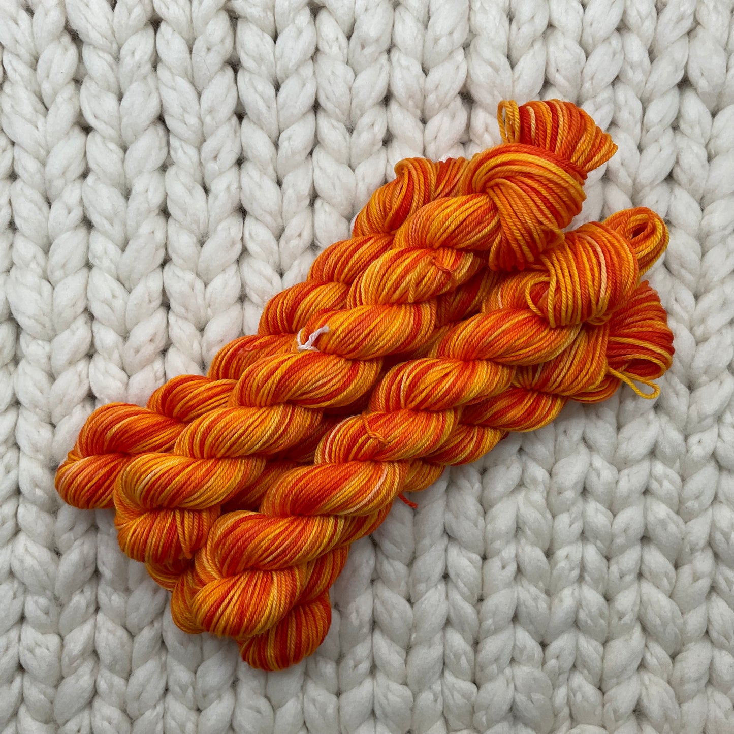 OOAK Orange Variegated Venti Practicality 75/25 Mini Skein